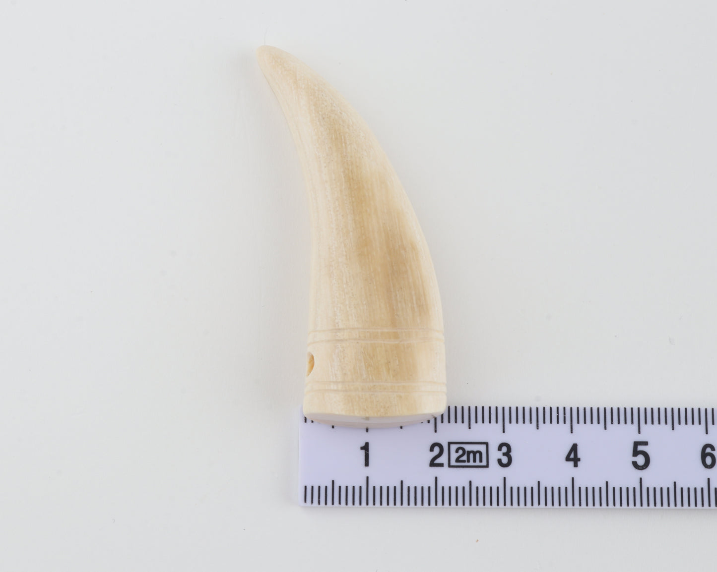 Carved mammoth ivory pendant