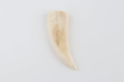 Carved mammoth ivory pendant