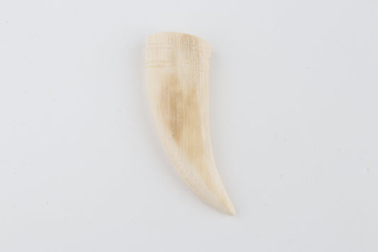 Carved mammoth ivory pendant