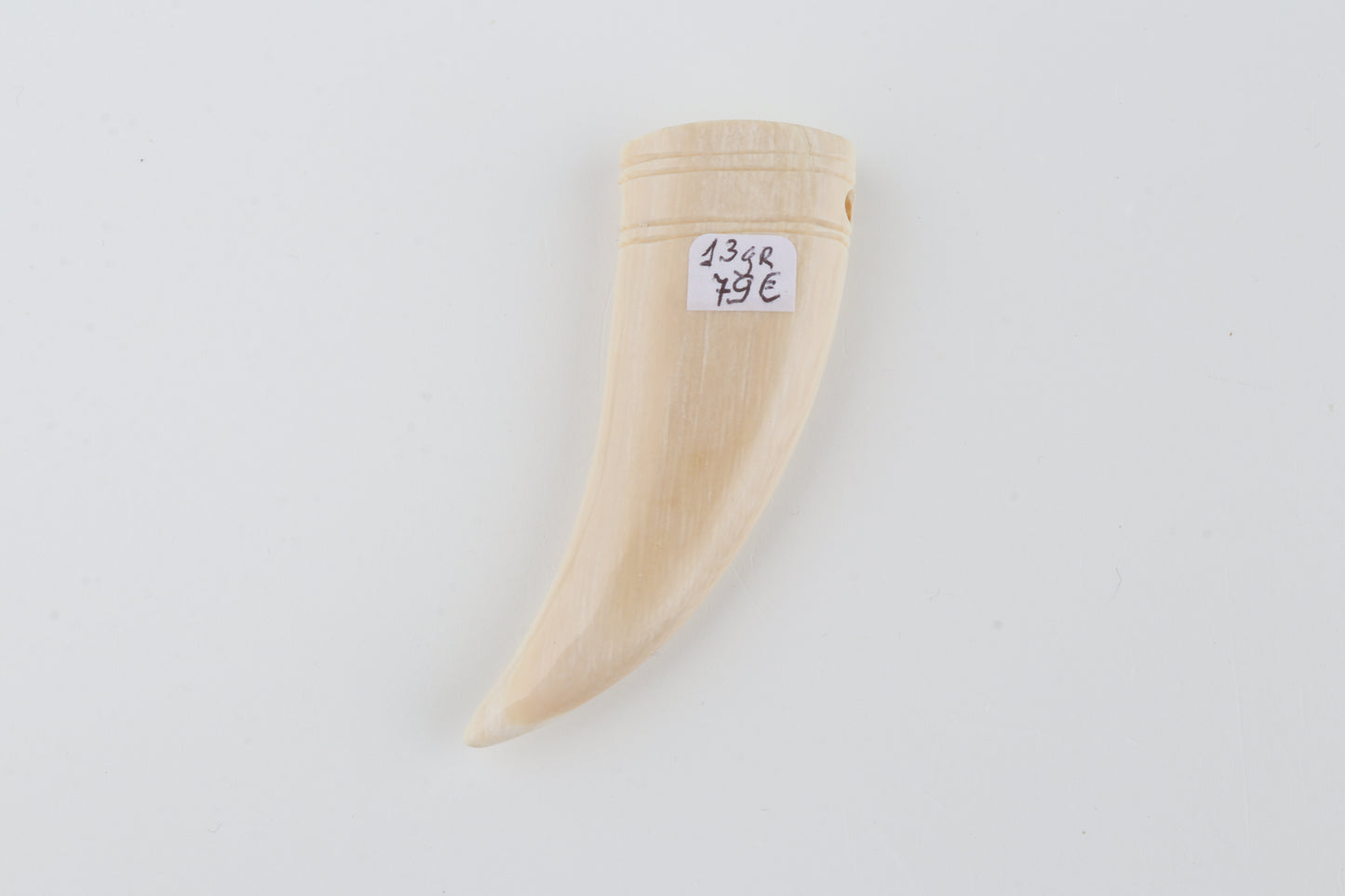 Carved mammoth ivory pendant