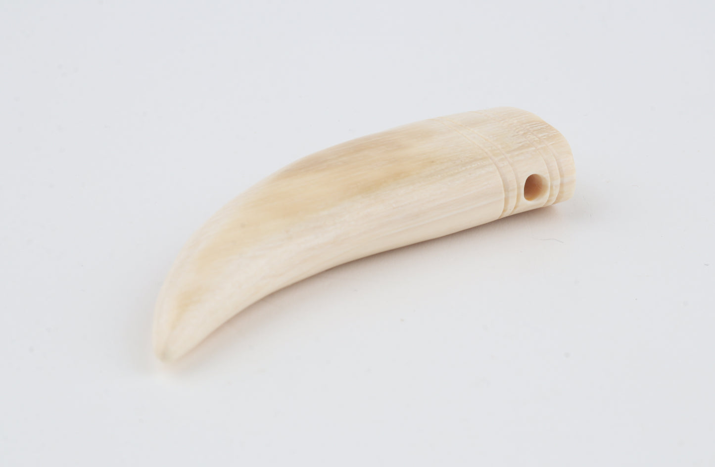 Carved mammoth ivory pendant