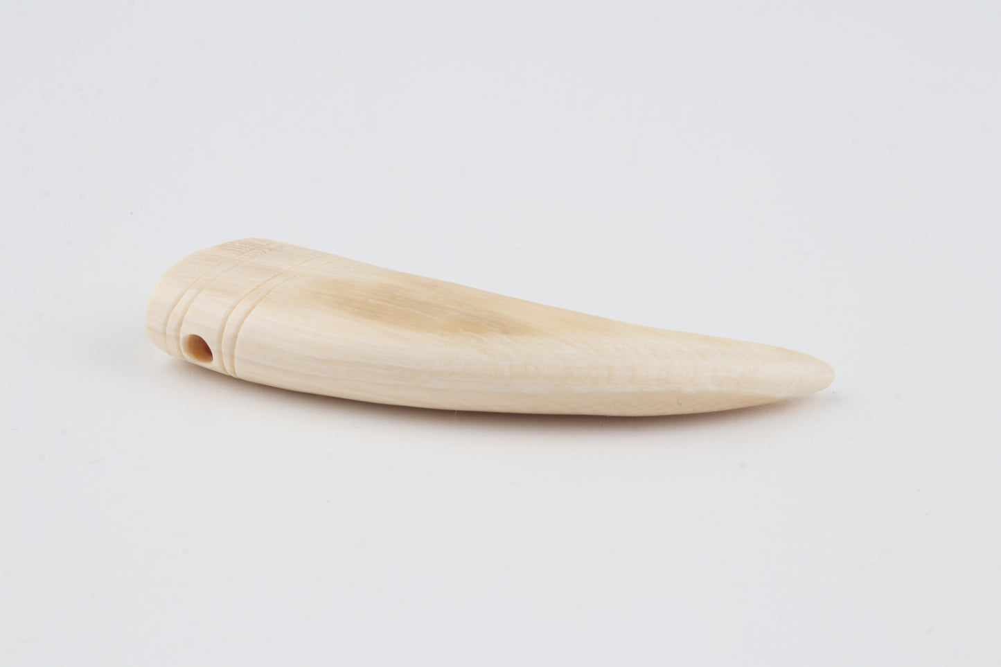 Carved mammoth ivory pendant
