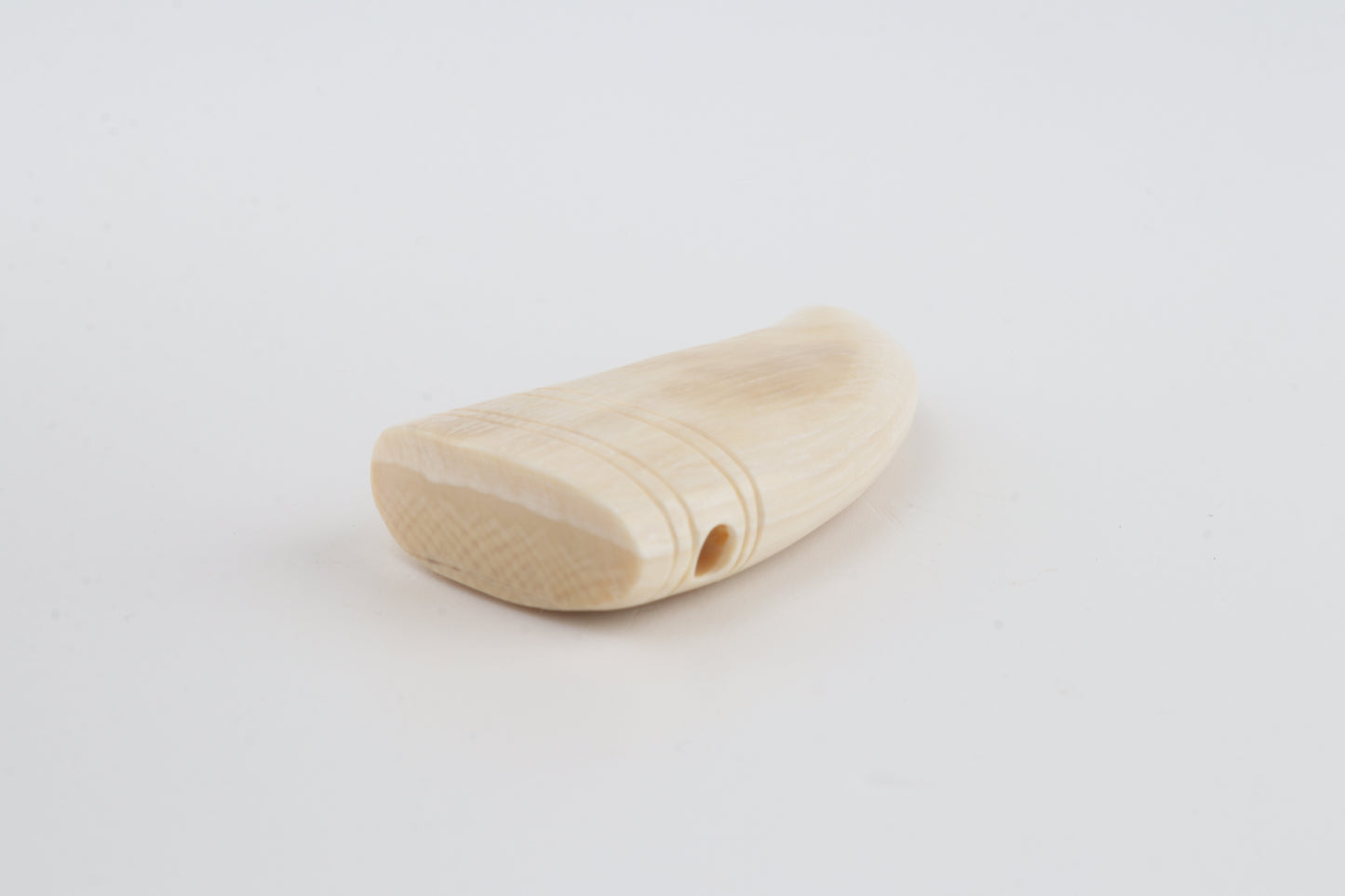 Carved mammoth ivory pendant