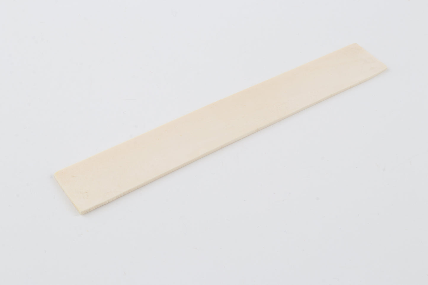 White mammoth ivory piece