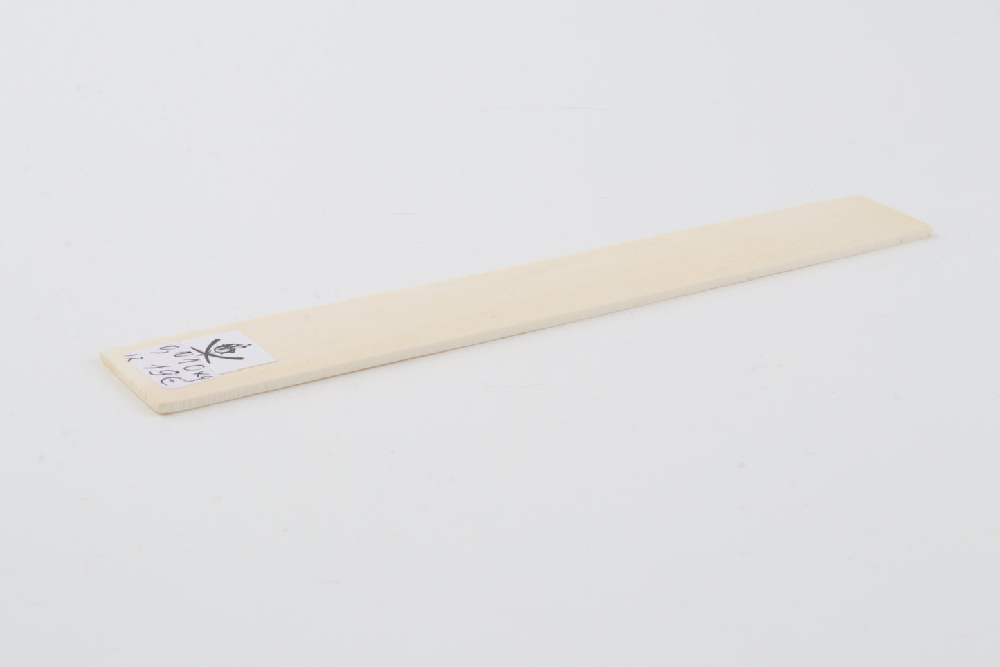 White mammoth ivory piece