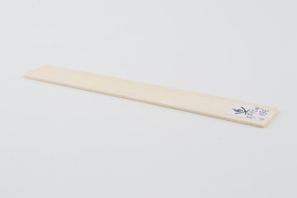 White mammoth ivory piece