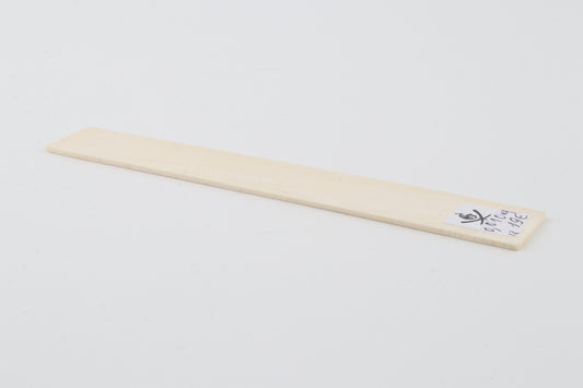 White mammoth ivory piece