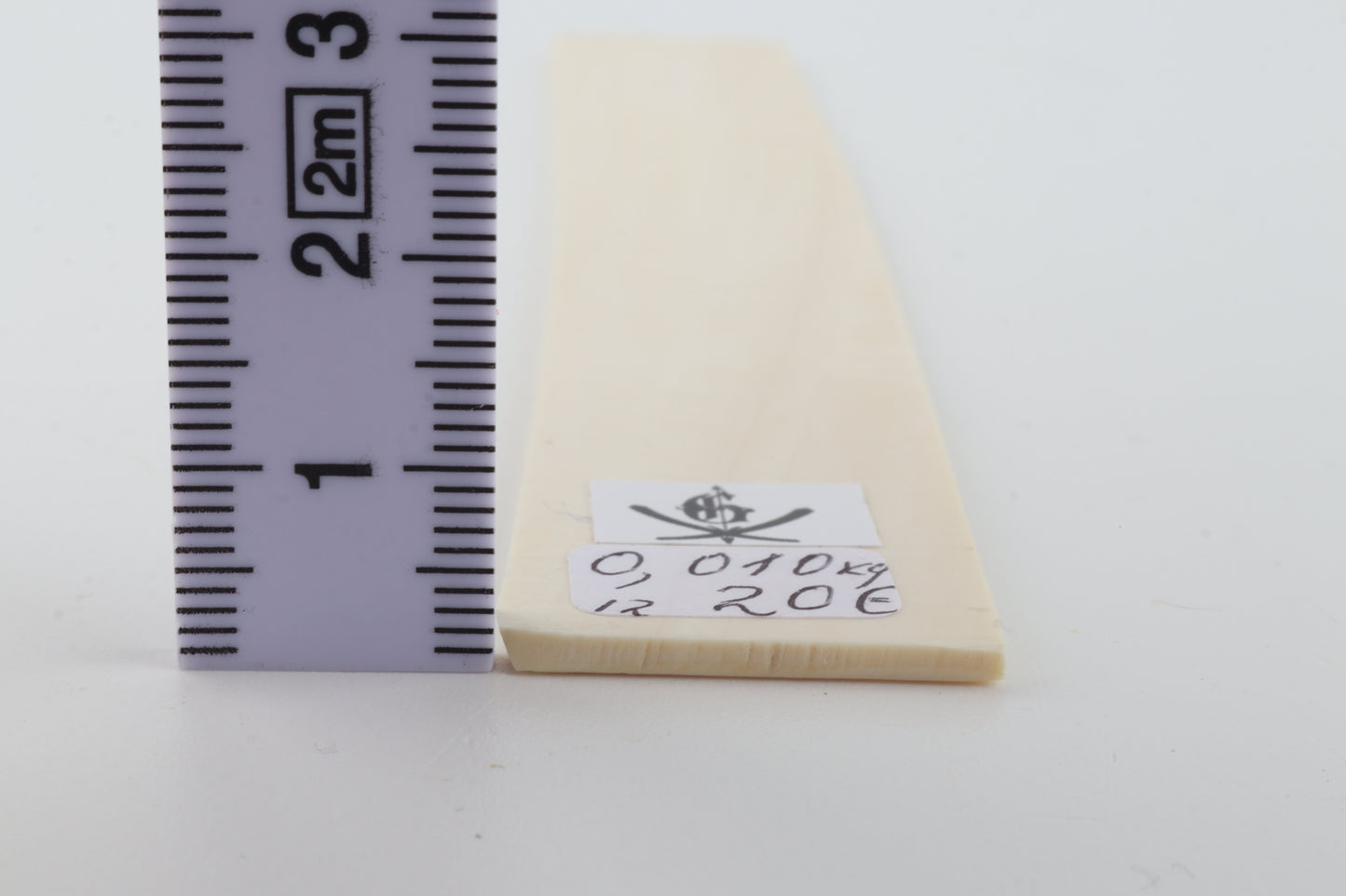 White mammoth ivory piece