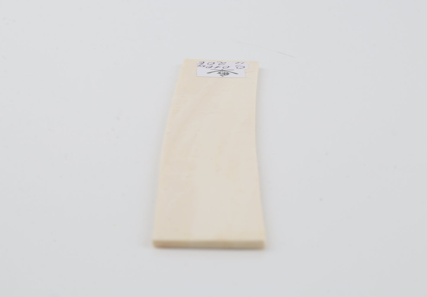 White mammoth ivory piece