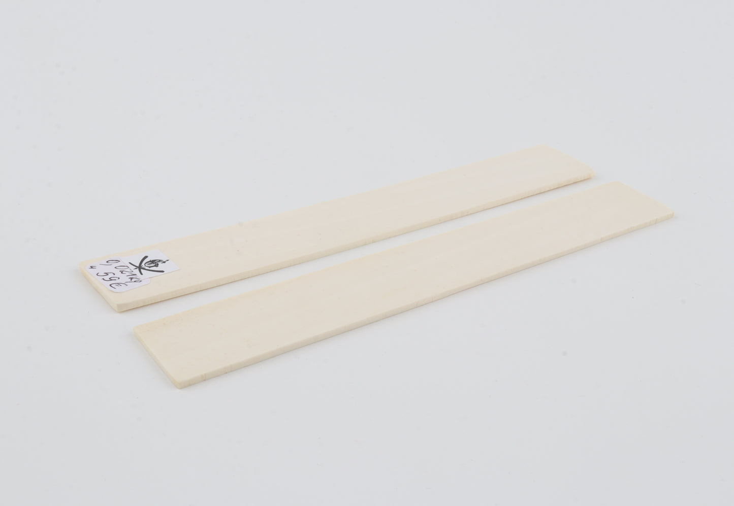 White mammoth ivory scales