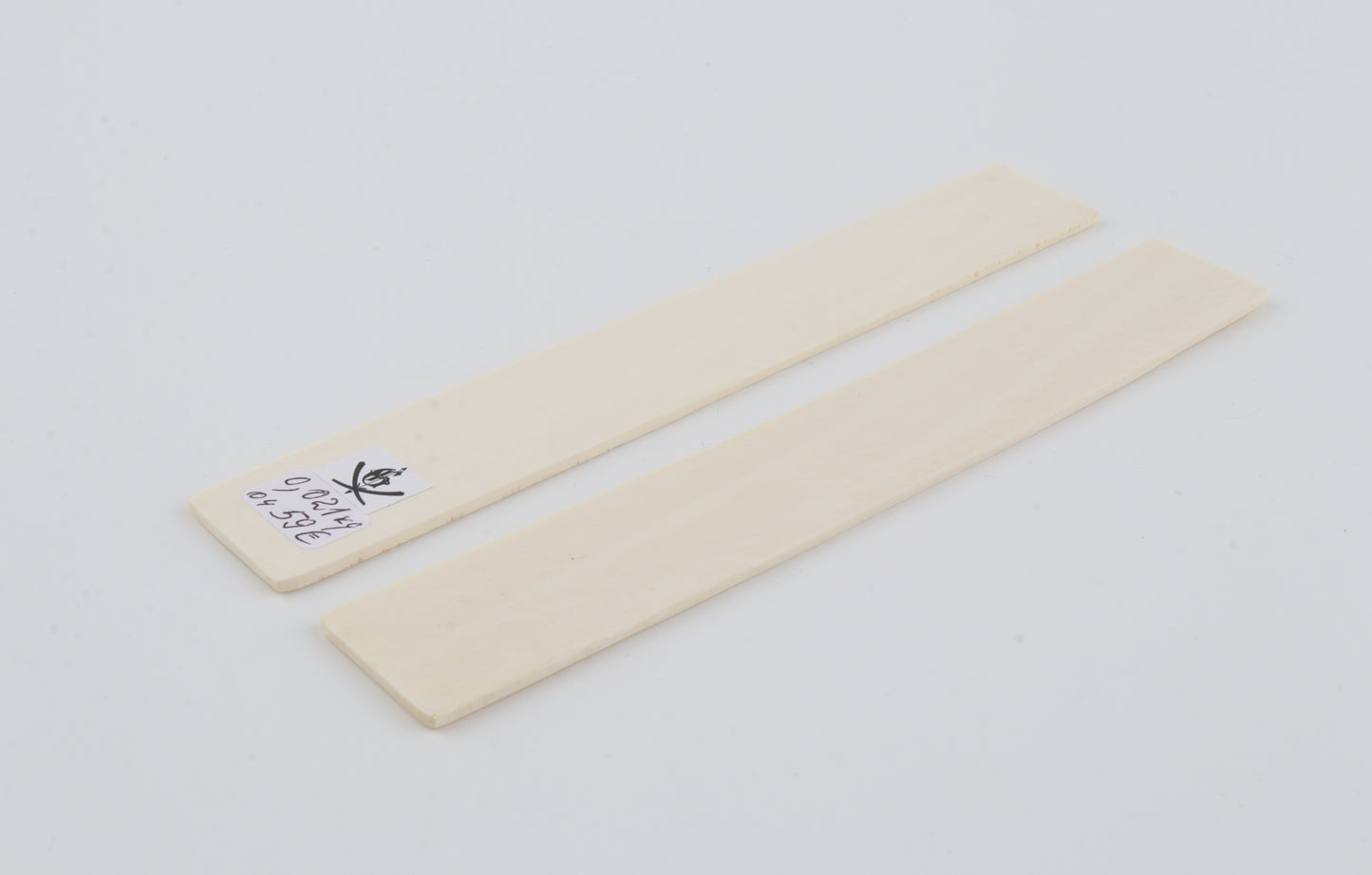 White mammoth ivory scales