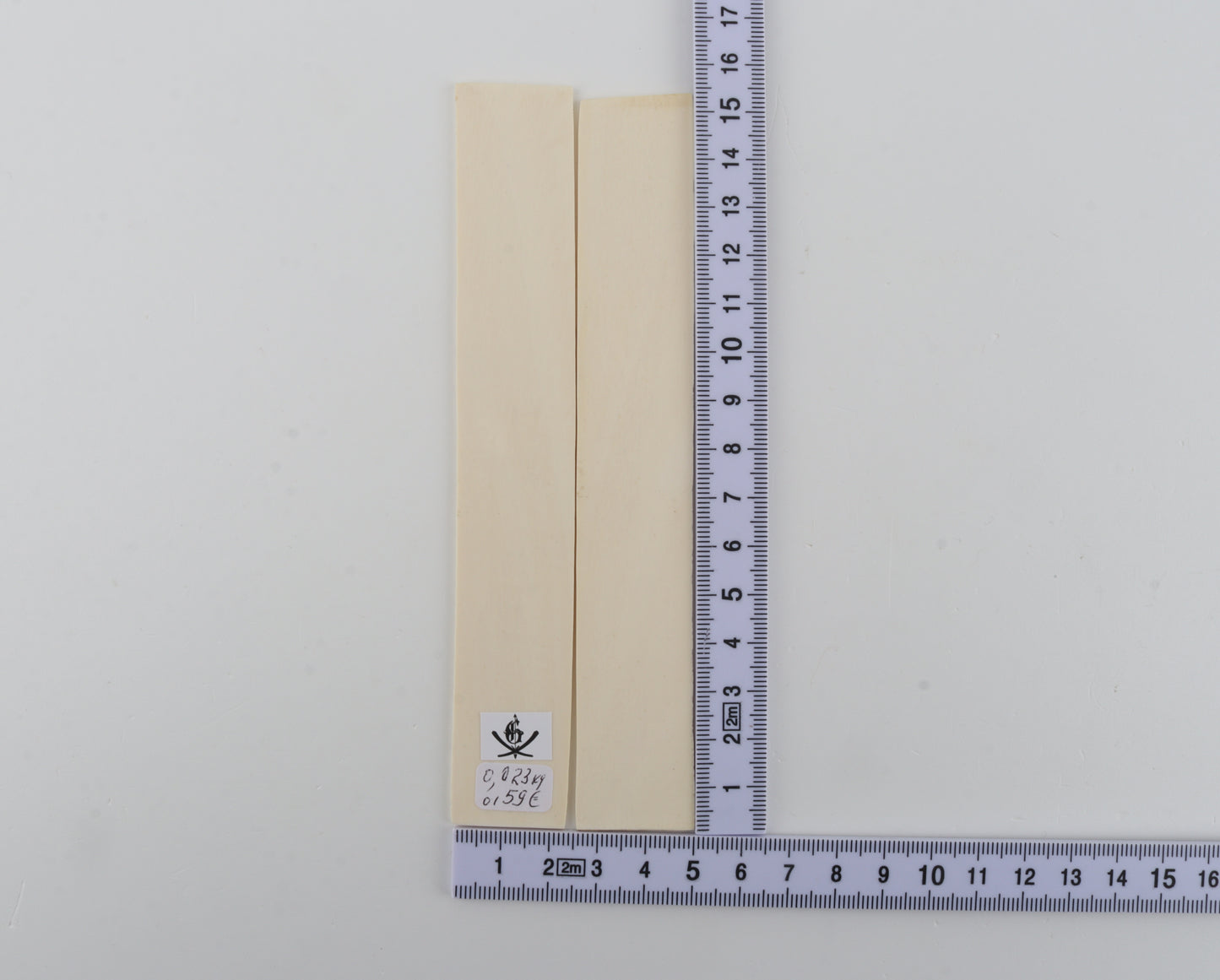 White mammoth ivory scales