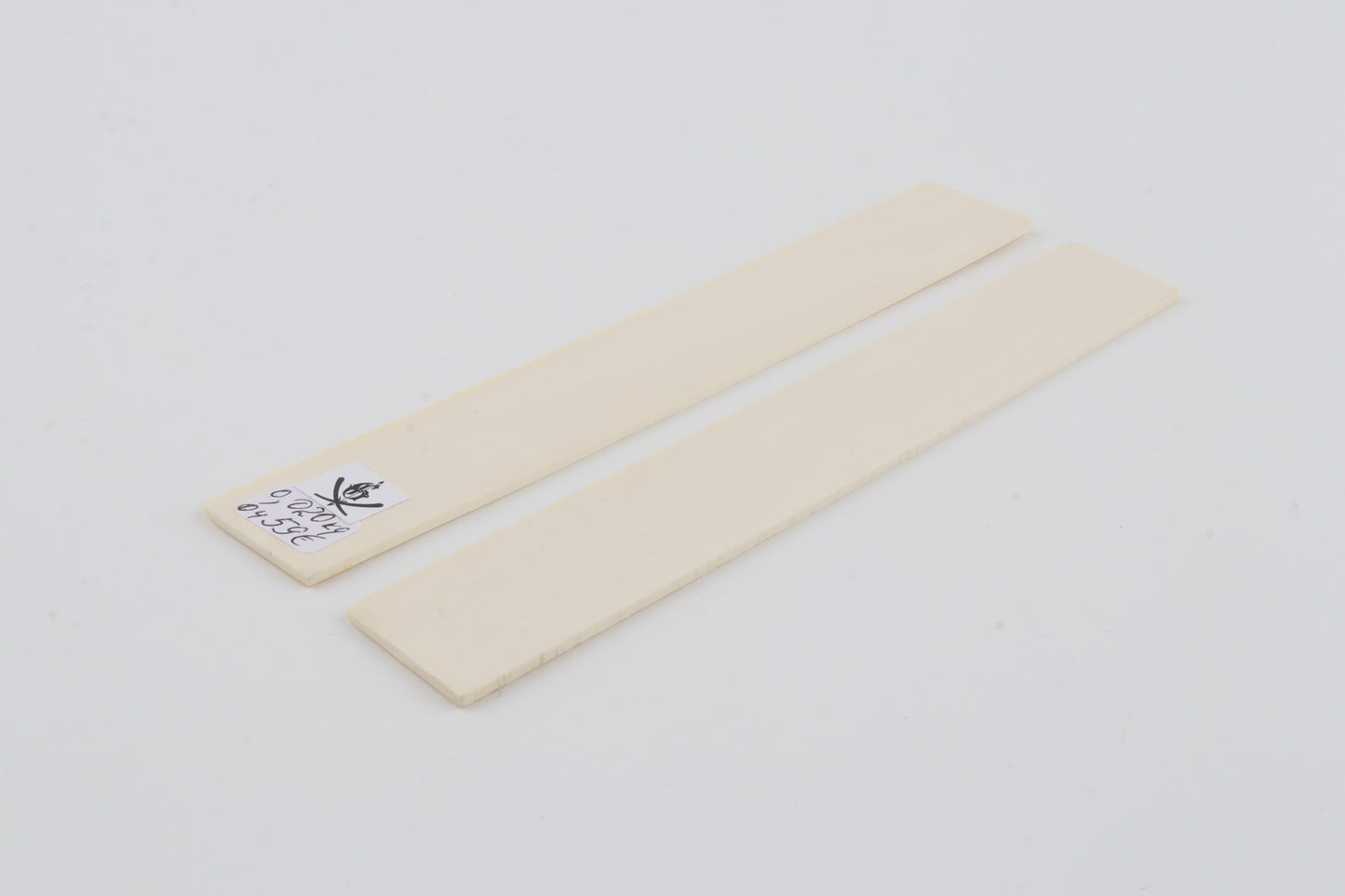 White mammoth ivory handles