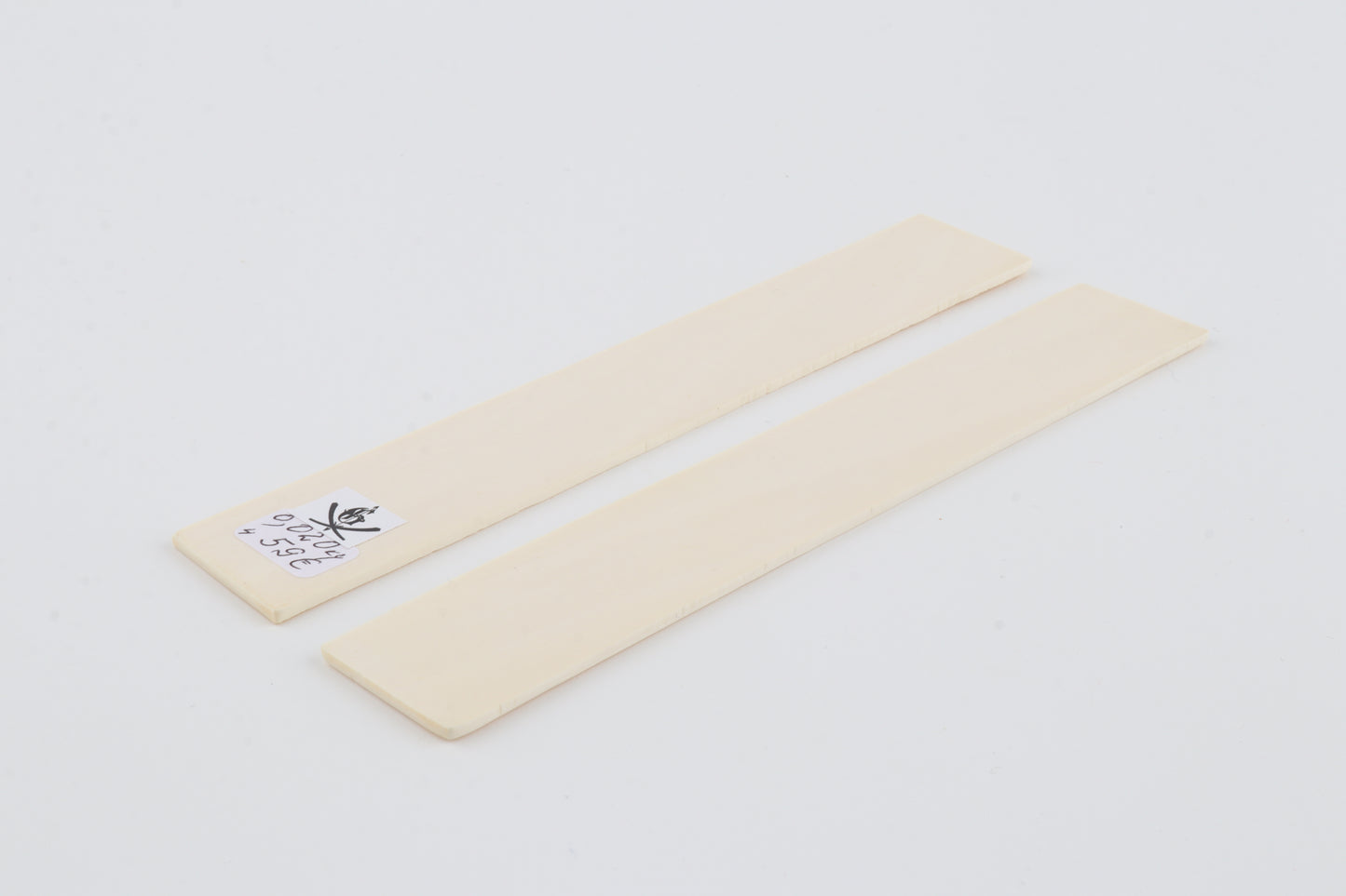 White mammoth ivory scales