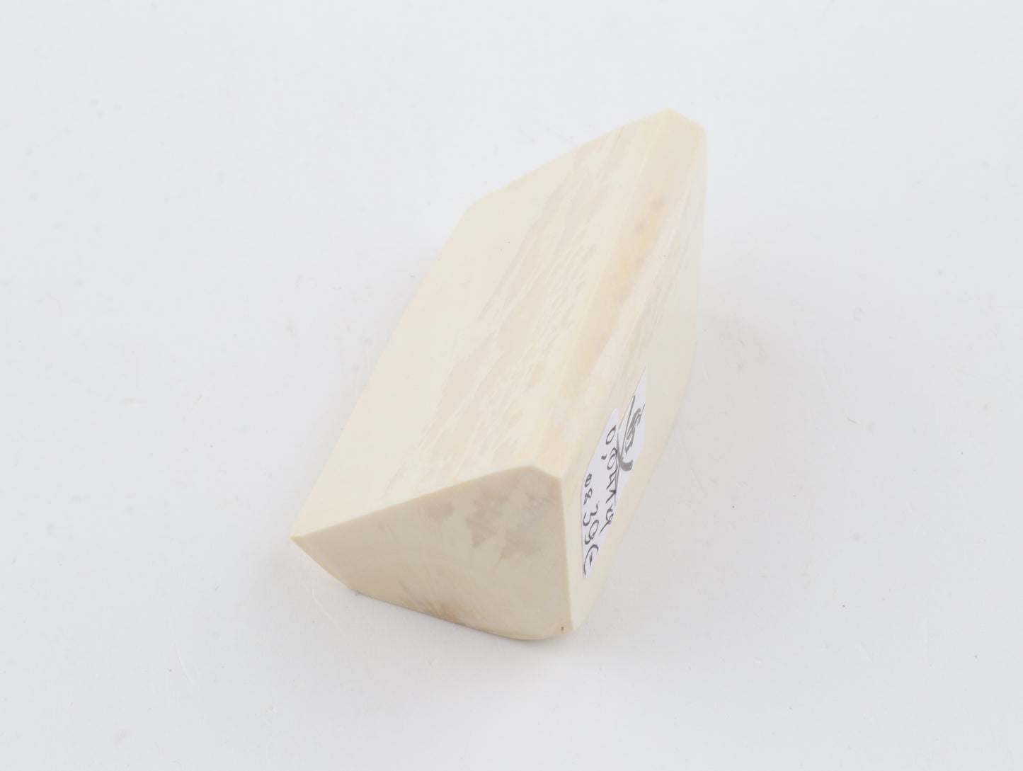 White mammoth ivory piece