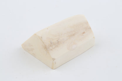 White mammoth ivory piece