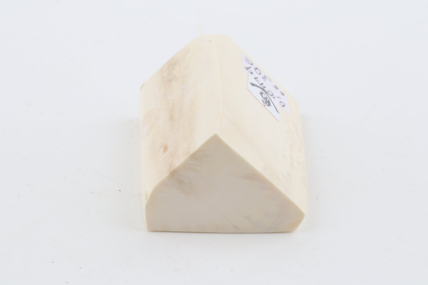 White mammoth ivory piece
