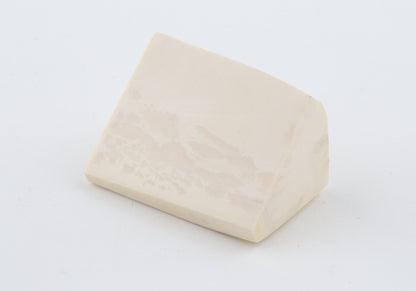 White mammoth ivory piece