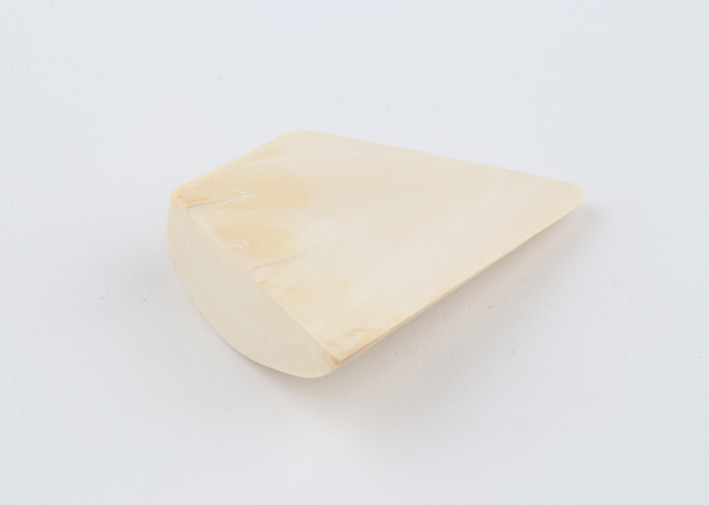 White mammoth ivory piece