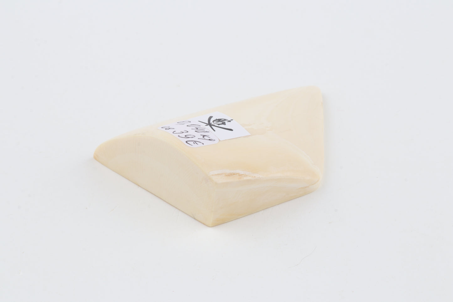 White mammoth ivory piece