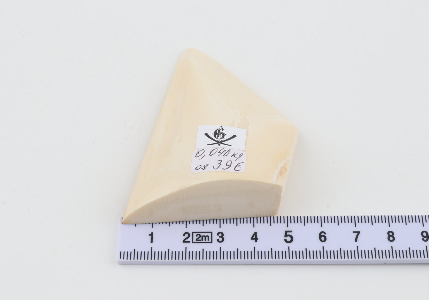 White mammoth ivory piece