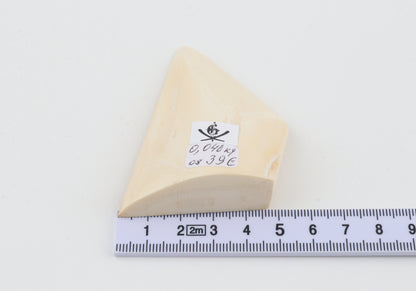 White mammoth ivory piece