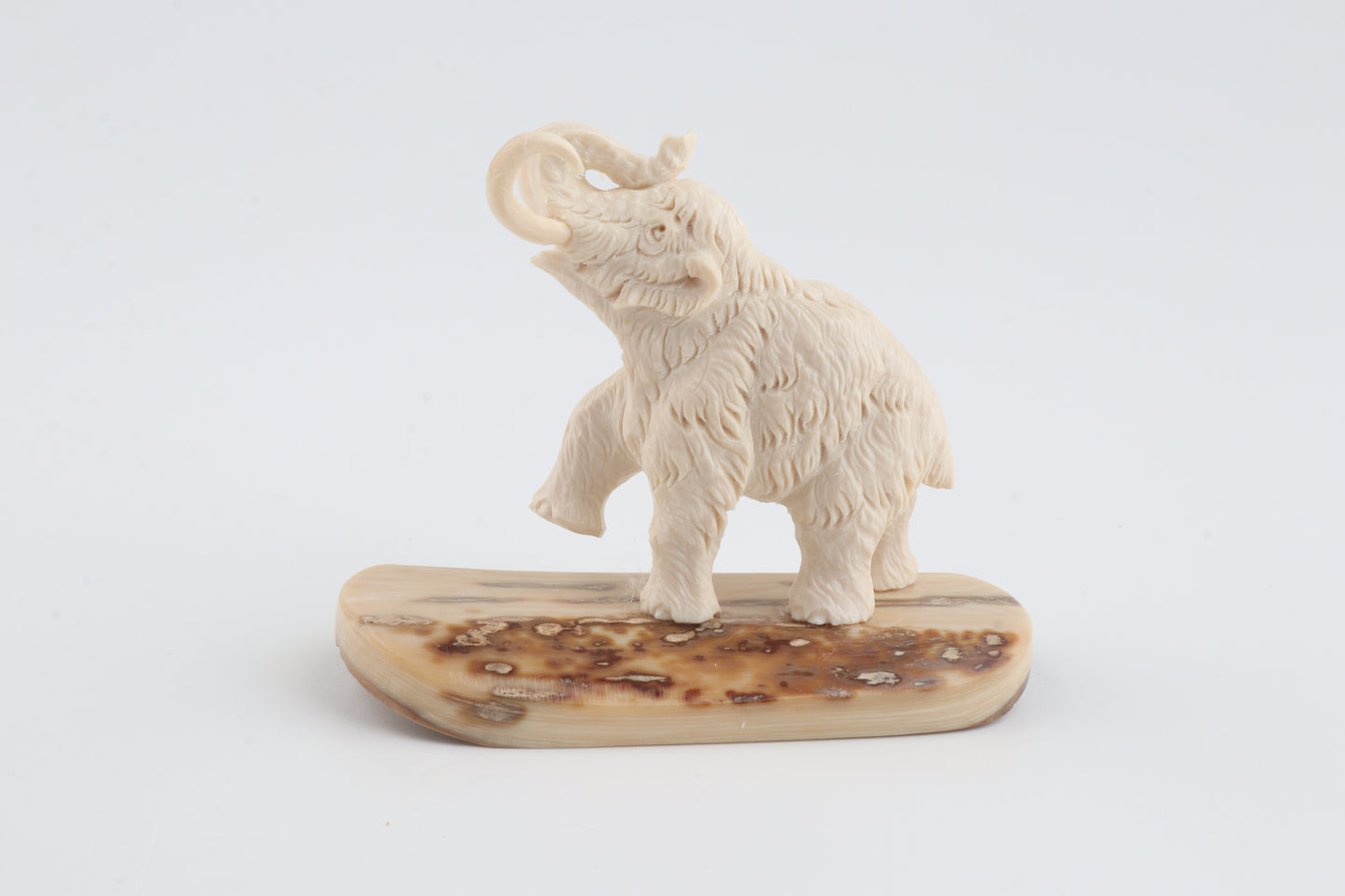 Carved woolly mammoth figurine