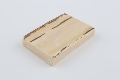 White mammoth ivory piece