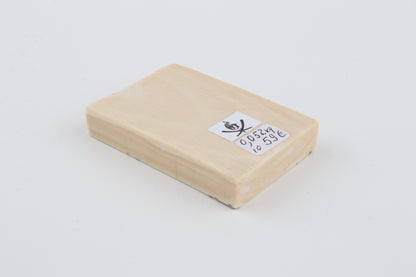 White mammoth ivory piece