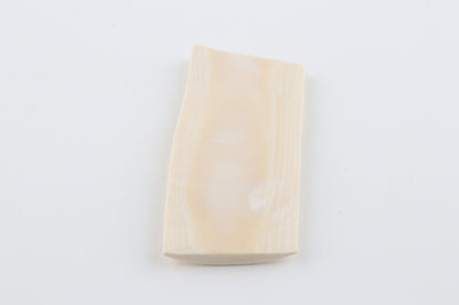 White mammoth ivory piece