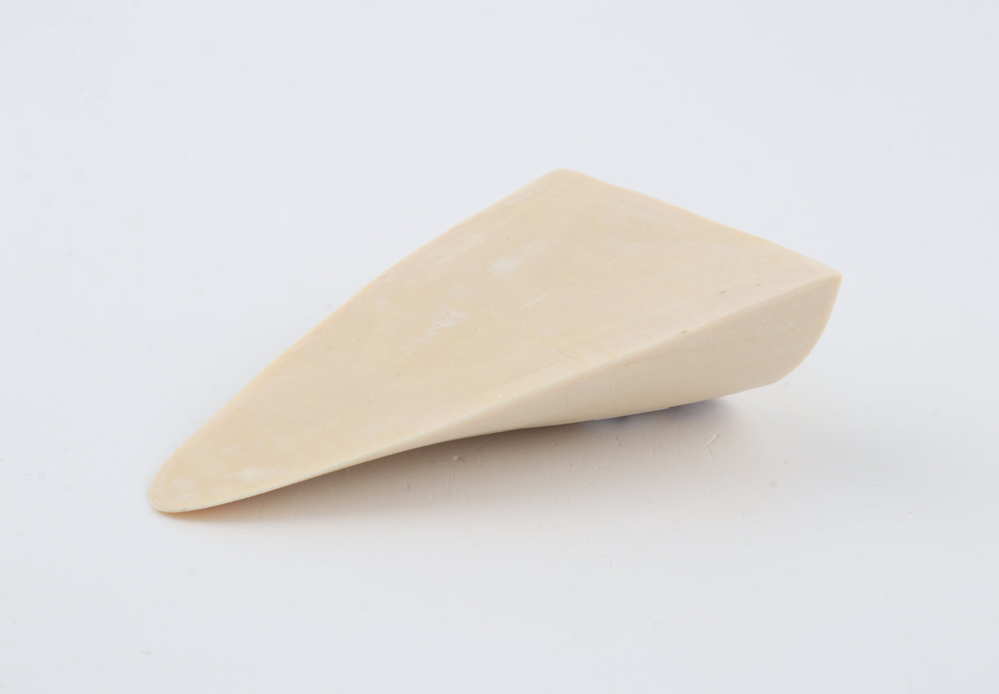 White mammoth ivory piece
