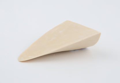 White mammoth ivory piece