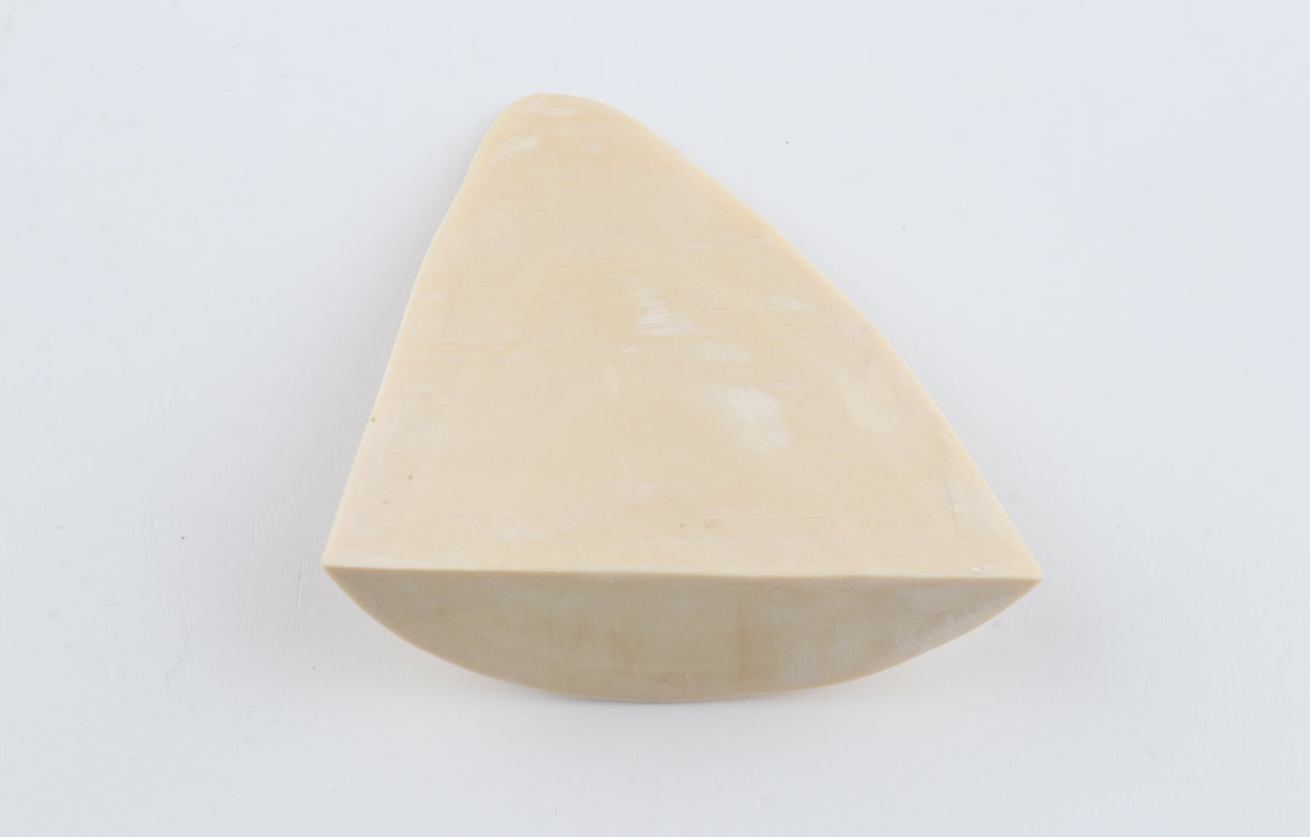 White mammoth ivory piece