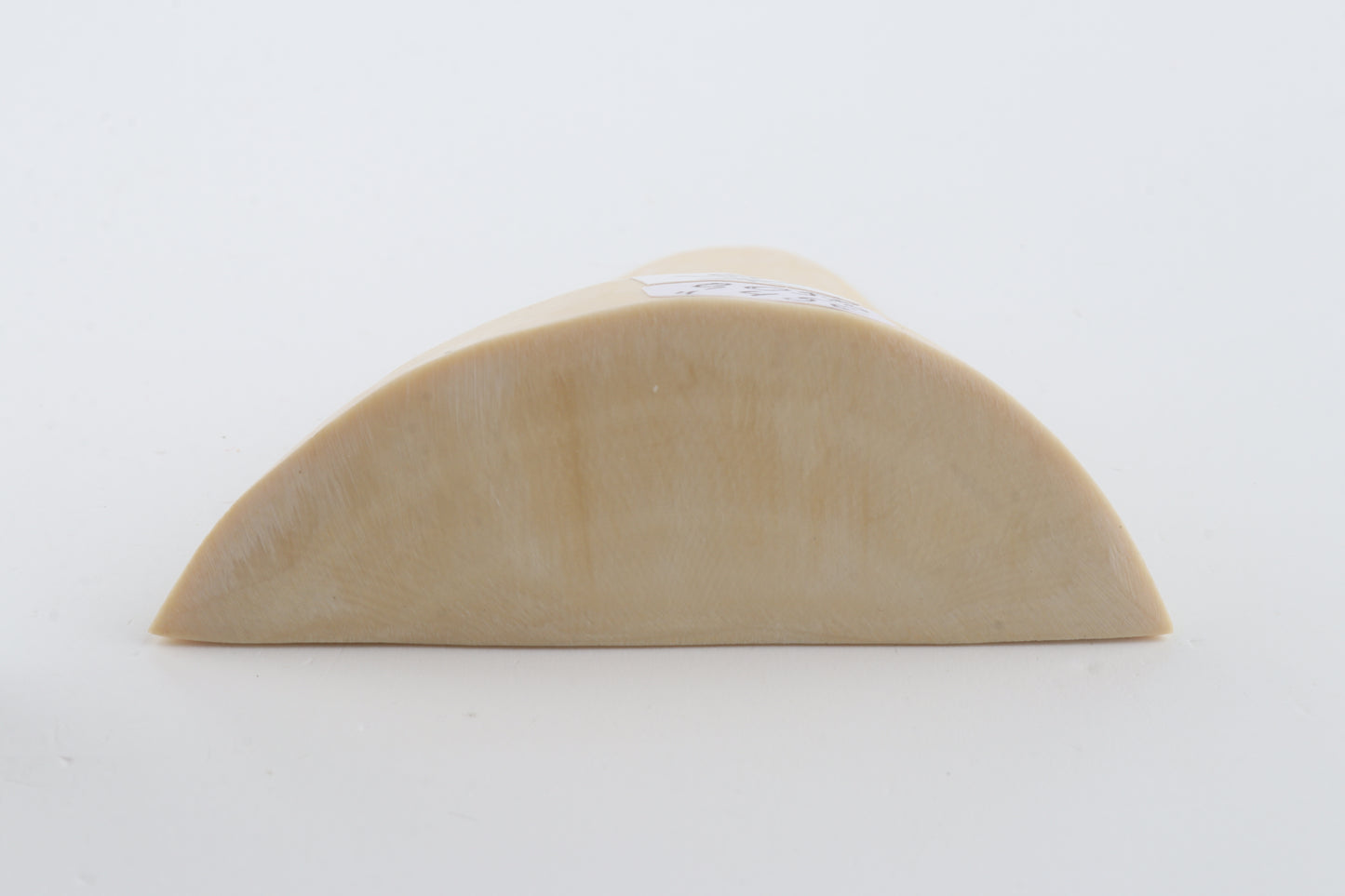 White mammoth ivory piece