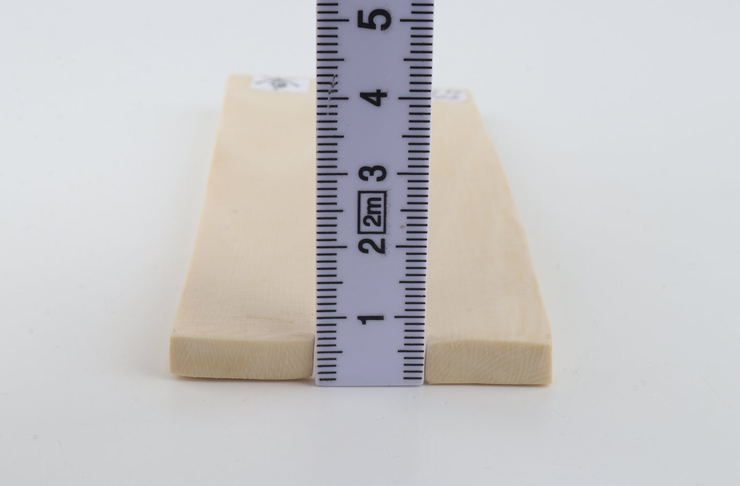 White mammoth ivory scales