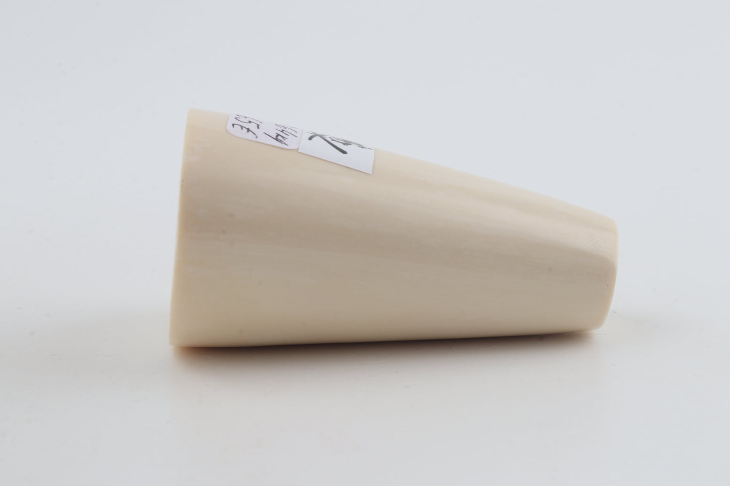 Round mammoth tusk piece