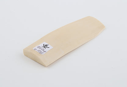 White mammoth ivory piece