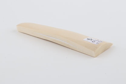 White mammoth ivory piece