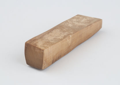 Brown mammoth ivory piece