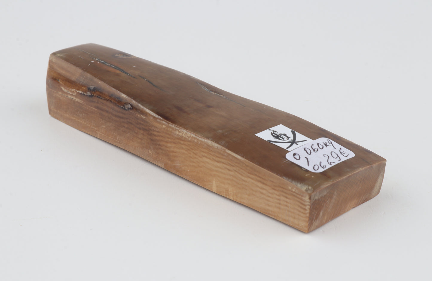 Brown mammoth ivory piece