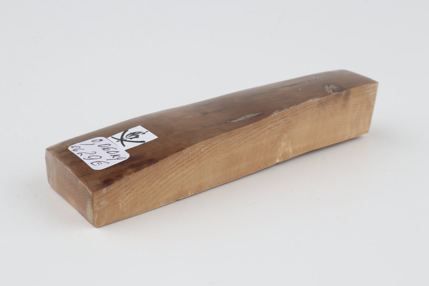 Brown mammoth ivory piece