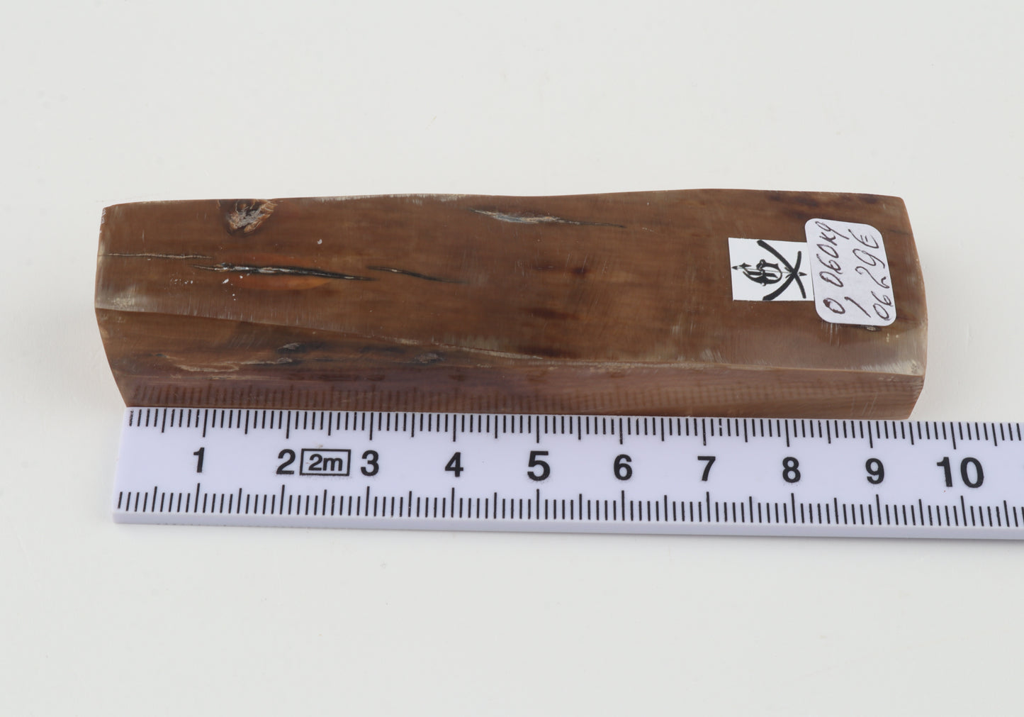 Brown mammoth ivory piece