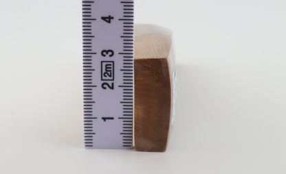 Brown mammoth ivory piece