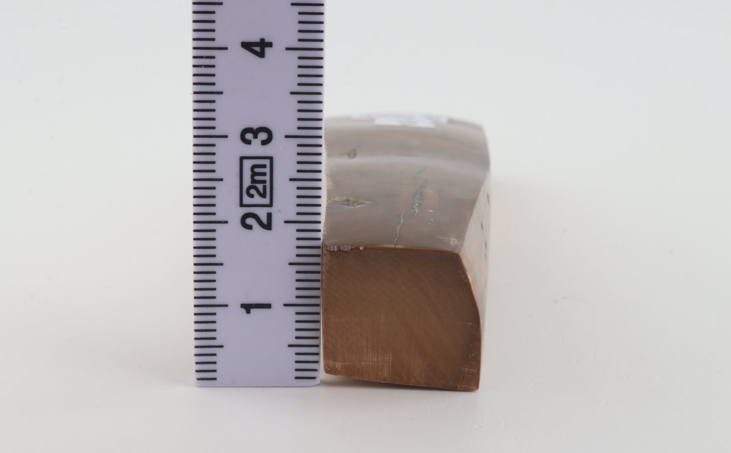 Brown mammoth ivory piece