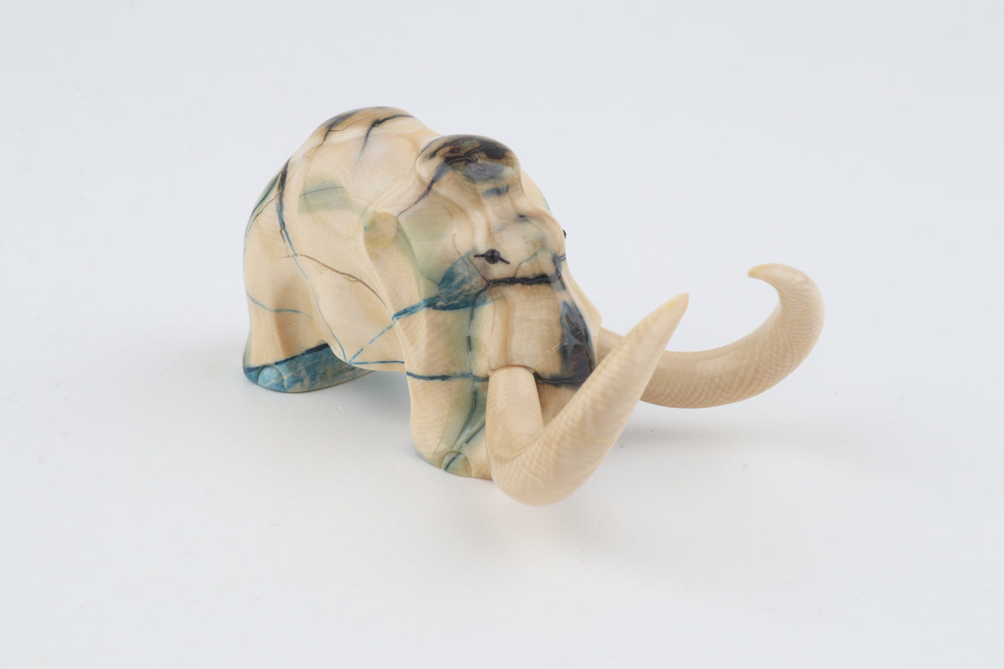Hand-carved woolly mammoth figurine