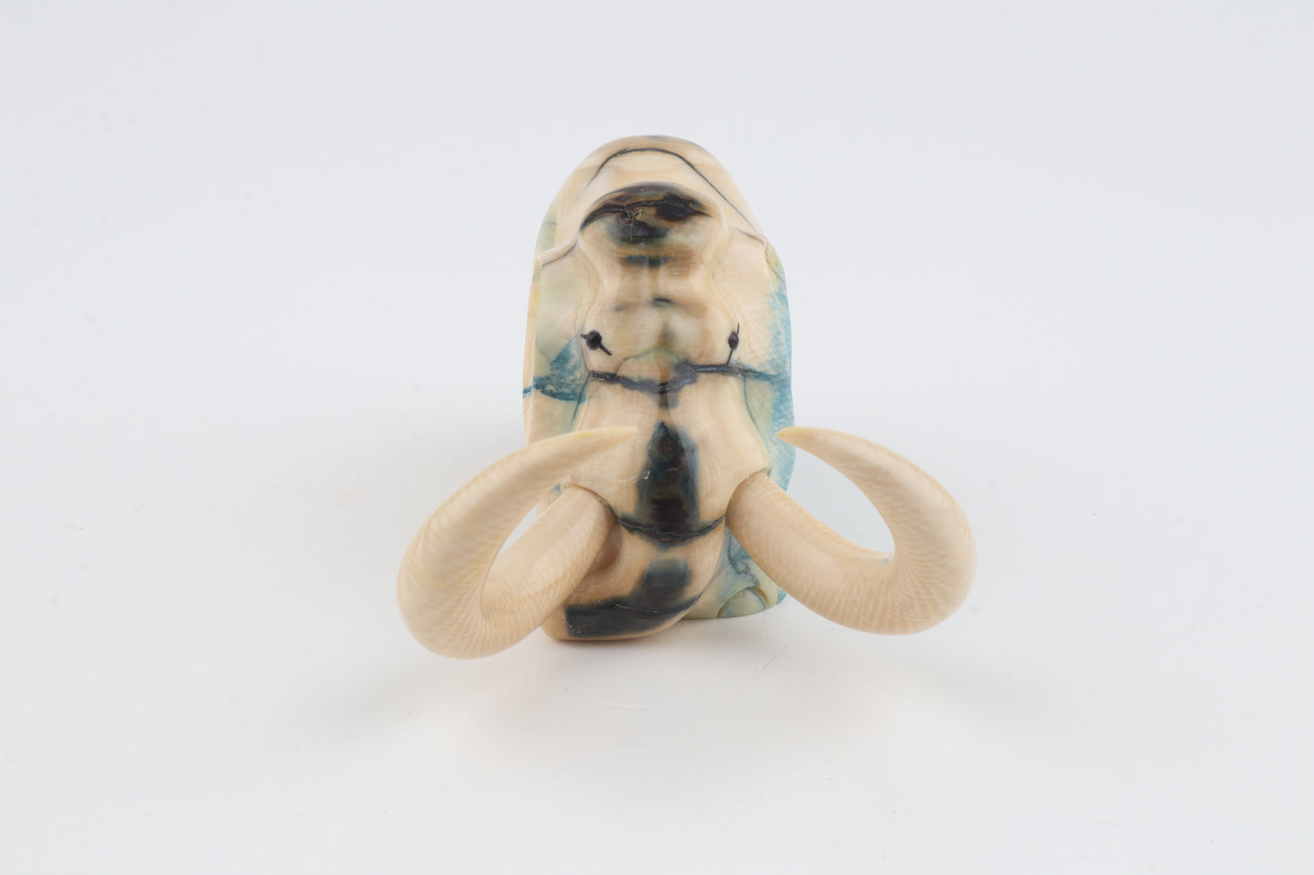 Hand-carved woolly mammoth figurine