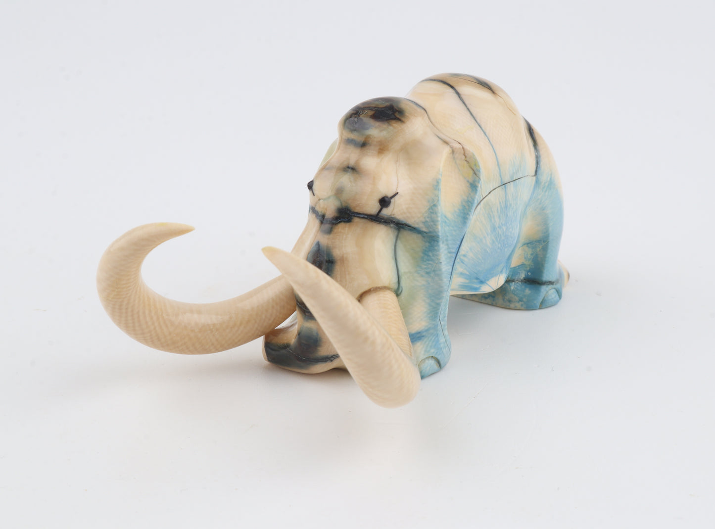 Hand-carved woolly mammoth figurine