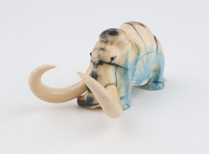 Hand-carved woolly mammoth figurine