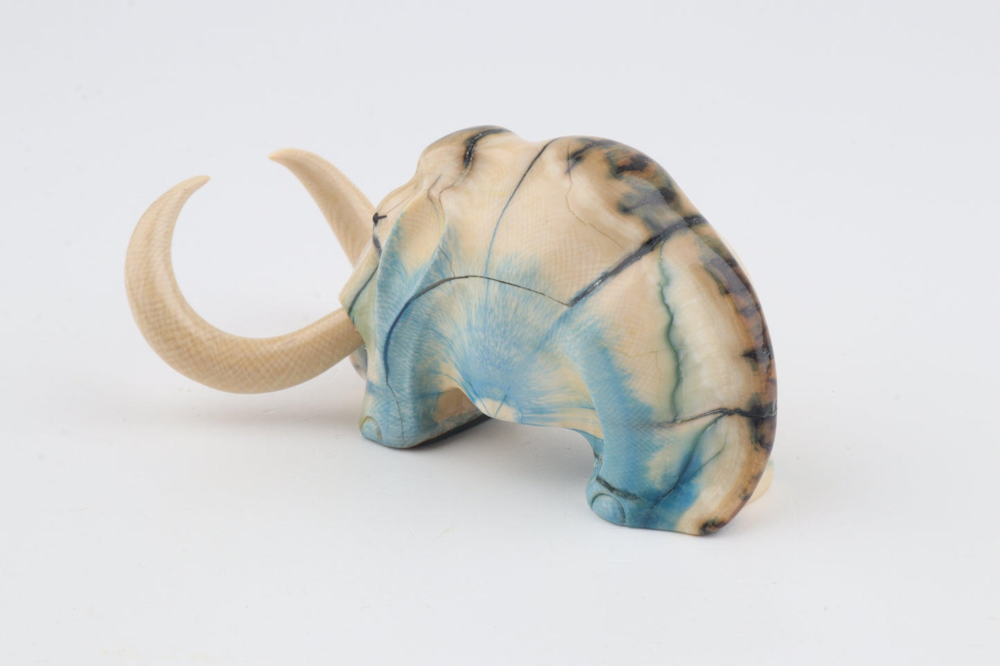 Hand-carved woolly mammoth figurine