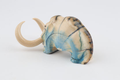 Hand-carved woolly mammoth figurine